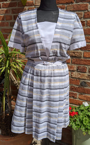 Pale striped poly dress size 14/16