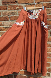 Caramel coloured midi skirt with floral detail waist 29-34"